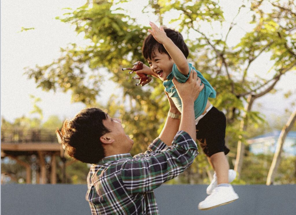 Healthy Child Support Plan This is an image of a father playing with his child.