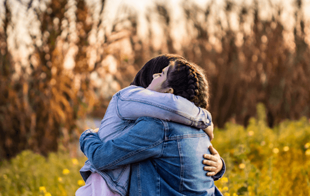 A picture of girls hugging each other