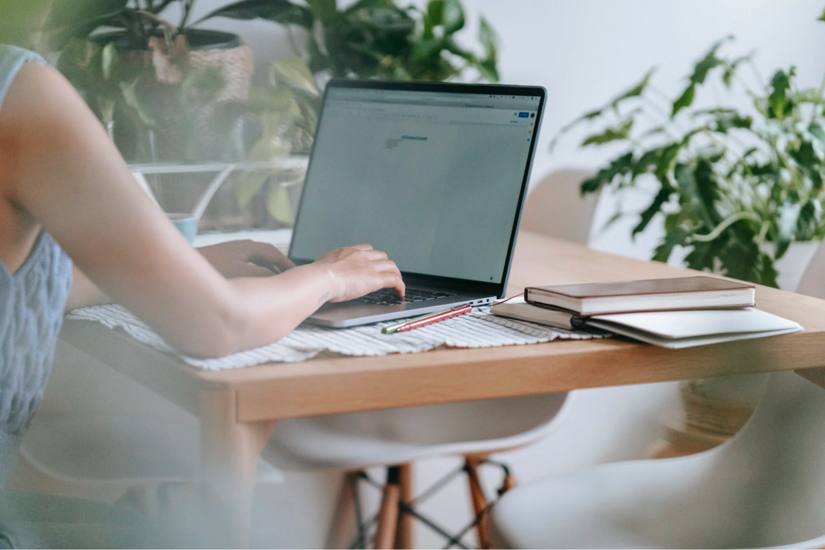 This is an image of a person making an alimony payment on their laptop.