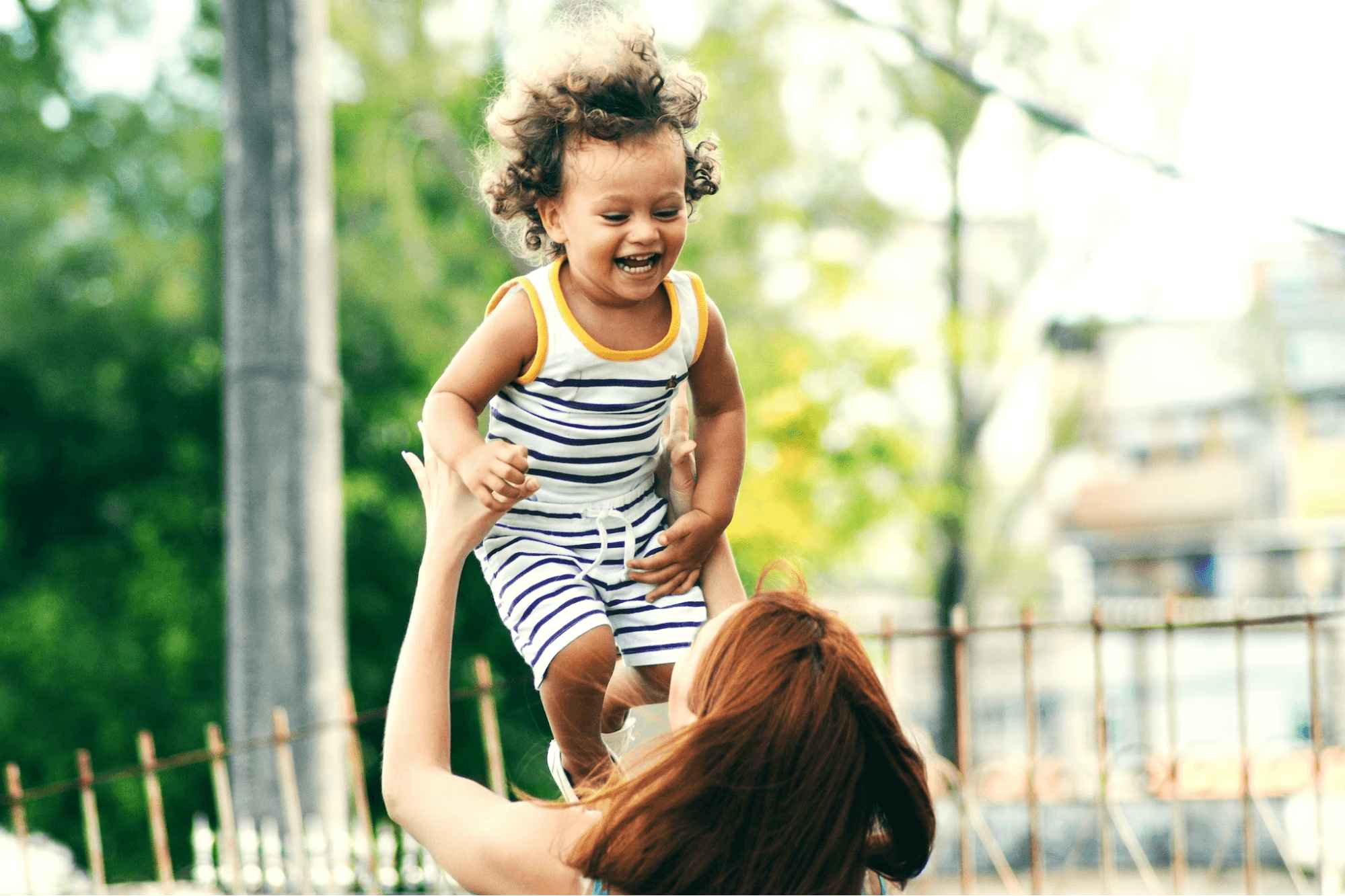 Parent and Child Child being picked up by parent