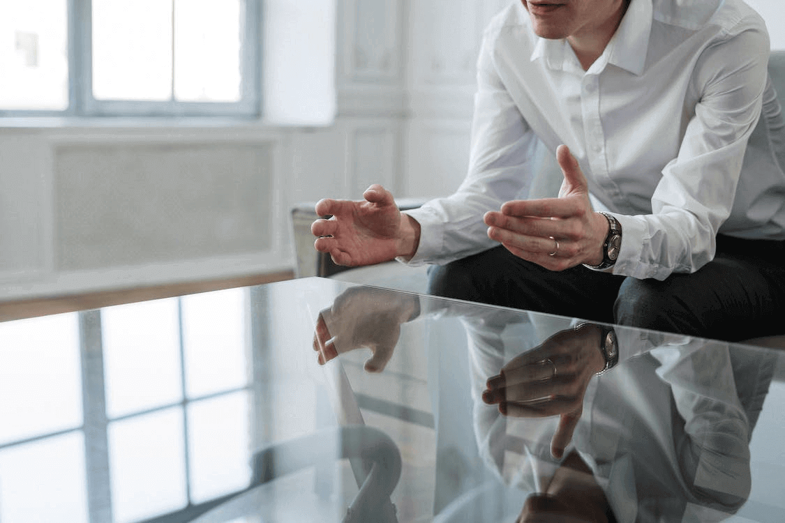 Divorce Mediator A divorce mediator at a table